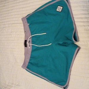 Men's shorts/short swimwear. American Eagle. Green w/ Grayish Purple Mens Small